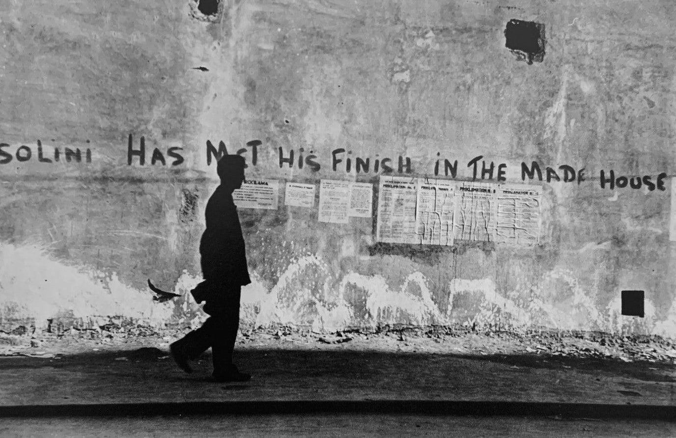 - Robert Capa - Italy, Napoli, 1944. Anti - Fascist slogans painted on Walls.